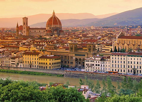 Aerial view of Florence, including Florence Cathedral and the Basilica of Santa Croce from across the Arno River in Italy